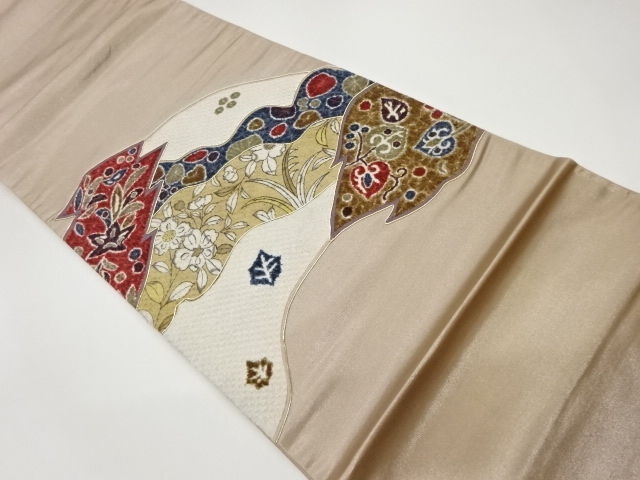 絞り切り嵌め風金駒刺繍変線に抽象草花模様織出し袋帯